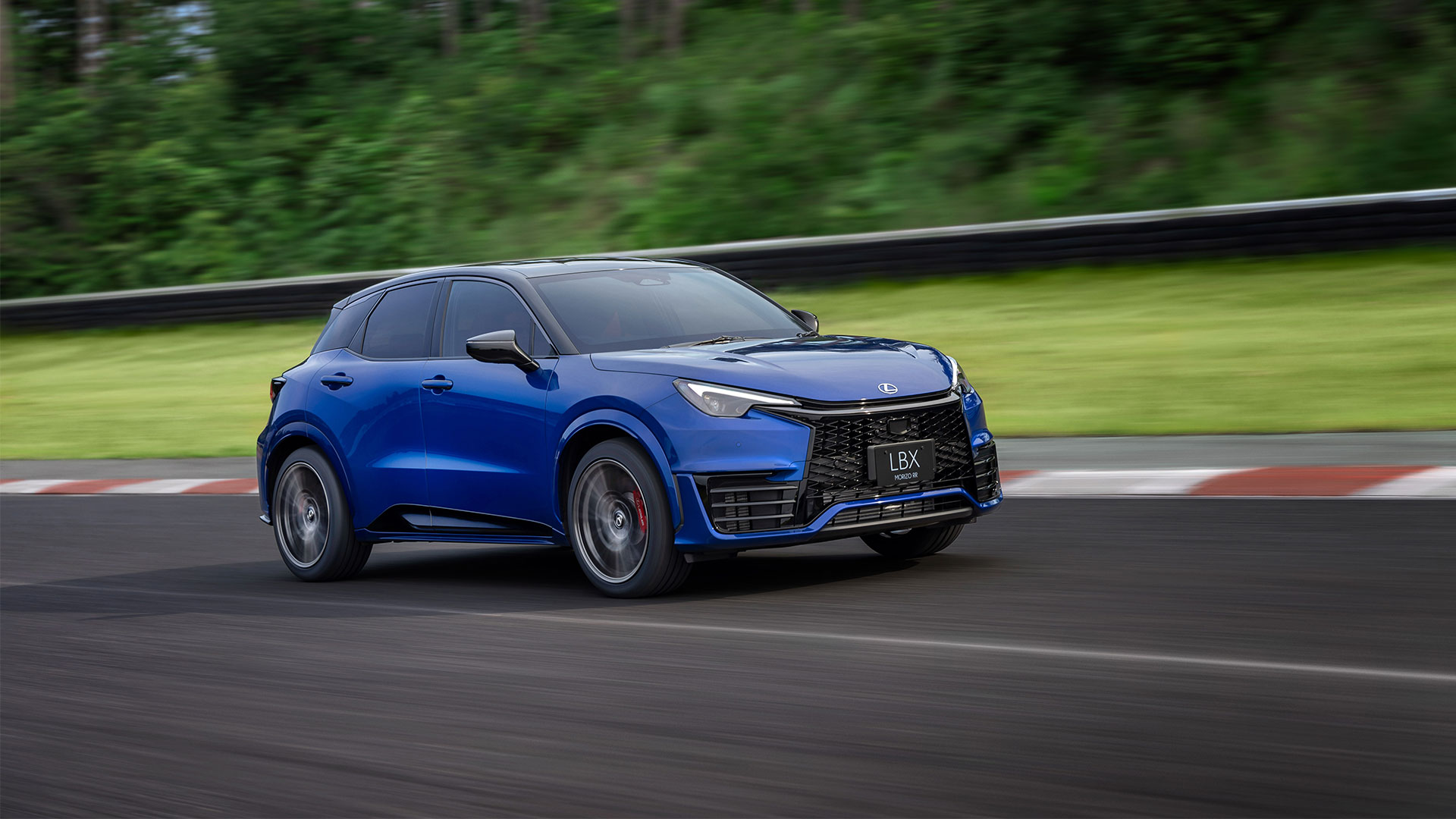 A blue Lexus LBX Morizo RR drives along a driving track